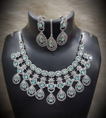 Silver-Plated Stone Necklace Set with Earrings & Maang Tikka | Designer Bridal & Party Wear Jewelry - Libasaa.com
