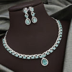 Silver-Plated Red Stone Necklace Set with Earrings | Bridal & Party Wear Designer Jewelry - Libasaa.com
