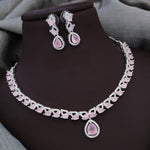 Silver-Plated Red Stone Necklace Set with Earrings | Bridal & Party Wear Designer Jewelry - Libasaa.com