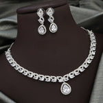Silver-Plated Red Stone Necklace Set with Earrings | Bridal & Party Wear Designer Jewelry - Libasaa.com