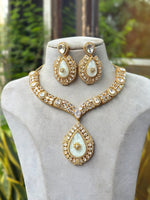 Gold Plated Red Stone Necklace Set with Earrings | Bridal & Party Wear Jewelry for Women - Libasaa.com