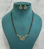 Designer Green CZ Mangalsutra Set with Double Chain & Matching Earrings - Libasaa.com