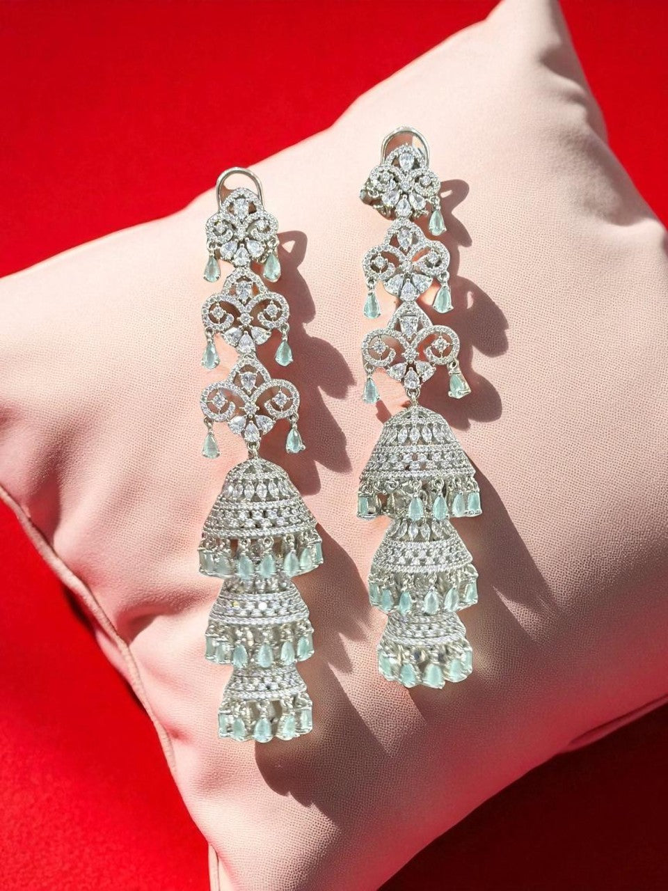 Triple Jhumka CZ Drop Earrings – Designer Tiered Danglers with Mint Green Accents - Libasaa.com