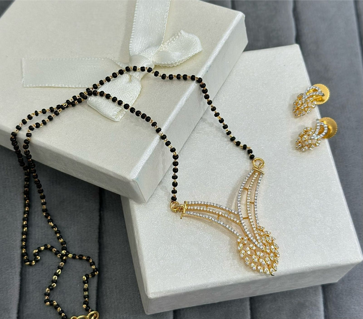Elegant CZ Stone Mangalsutra Set with Matching Earrings – Modern Bridal Jewelry - Libasaa.com
