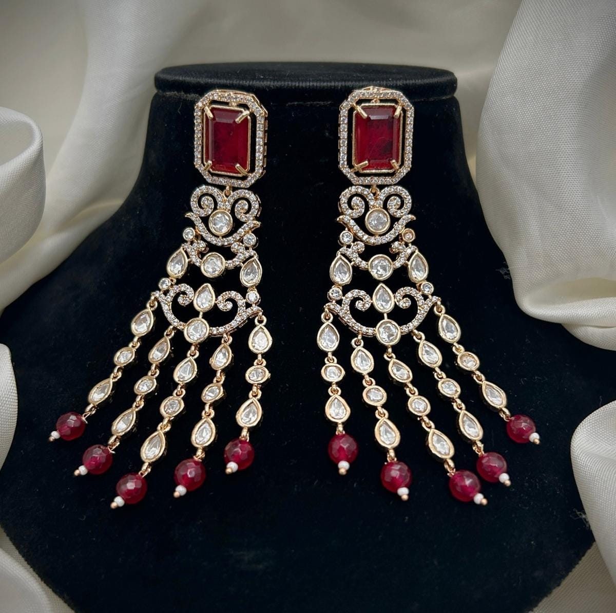 Gold Plated Green Stone Long Chandbali Earrings | Bridal & Party Wear Statement Jewelry - Libasaa.com