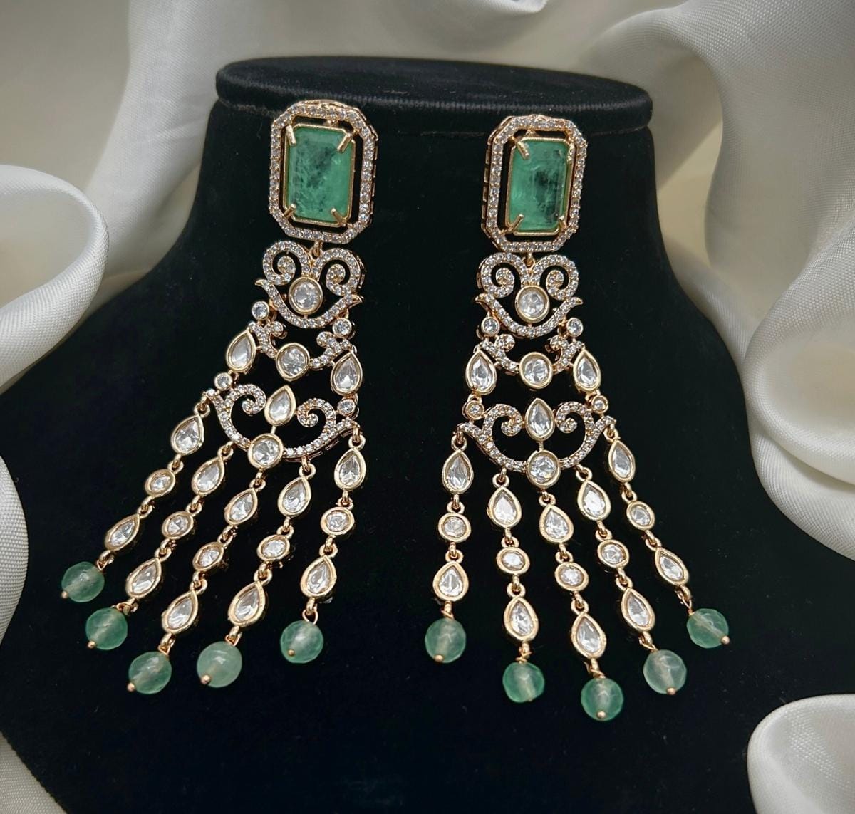 Gold Plated Green Stone Long Chandbali Earrings | Bridal & Party Wear Statement Jewelry - Libasaa.com