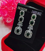 Silver-Plated Green Stone Long Drop Earrings | Stylish Party & Festive Wear Jewelry - Libasaa.com
