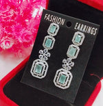 Silver-Plated Green Stone Long Drop Earrings | Stylish Party & Festive Wear Jewelry - Libasaa.com