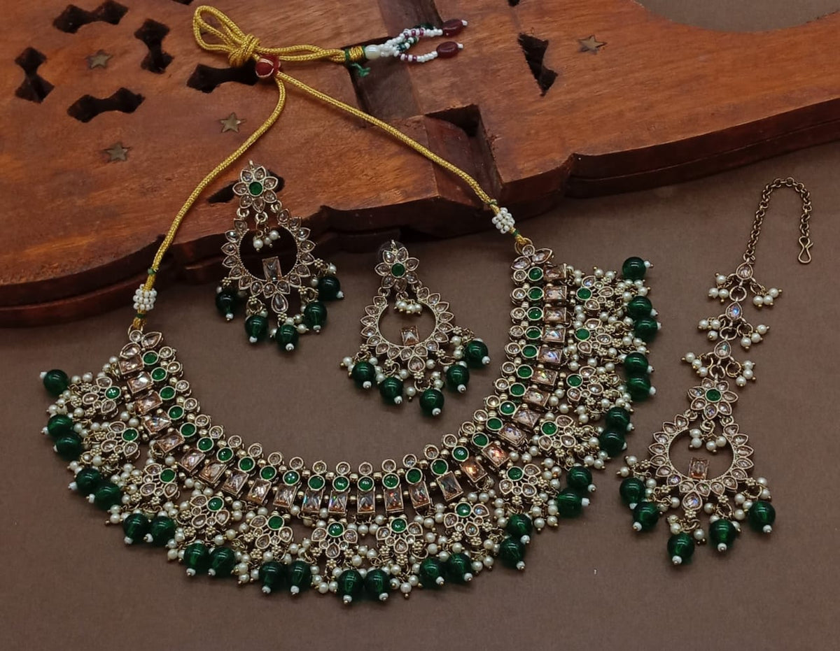 Green Golden tone Kundan Pearl Choker Necklace Earring Set with Maangtikka - Libasaa.com