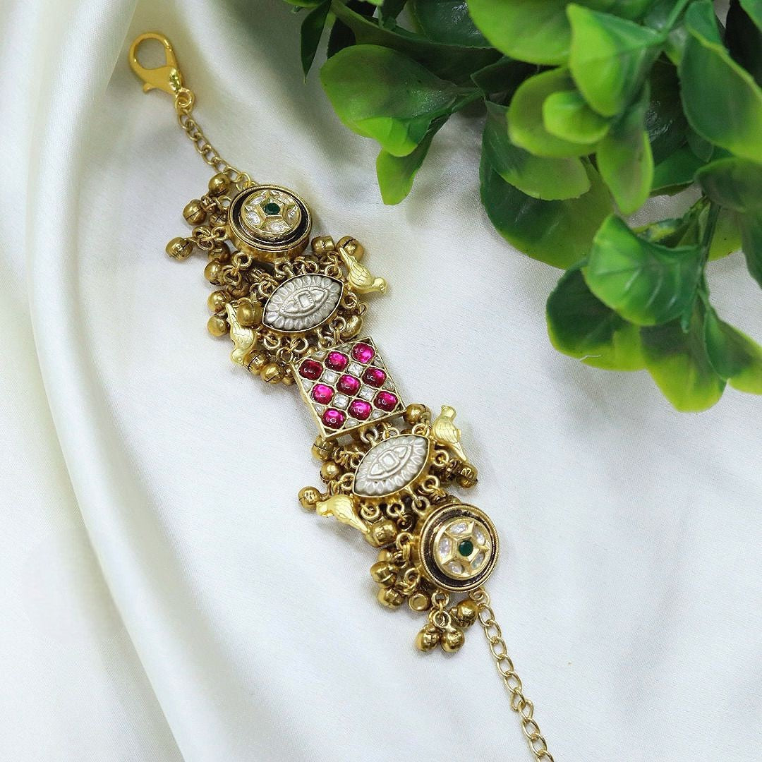 Traditional Gold Plated Bracelet with Kundan, Pearl & Pink Stone Detailing - Libasaa.com