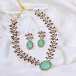 Rajsthani Pale Green Traditional AD Necklace Earrings Set For Women - Libasaa.com
