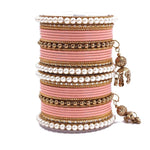 Indian bangle set , Bridal bangles, Metal bangles, Traditonal wedding jewelry, Brass Metal and Pearl Bridal Bangle Set with Jhumki - Libasaa