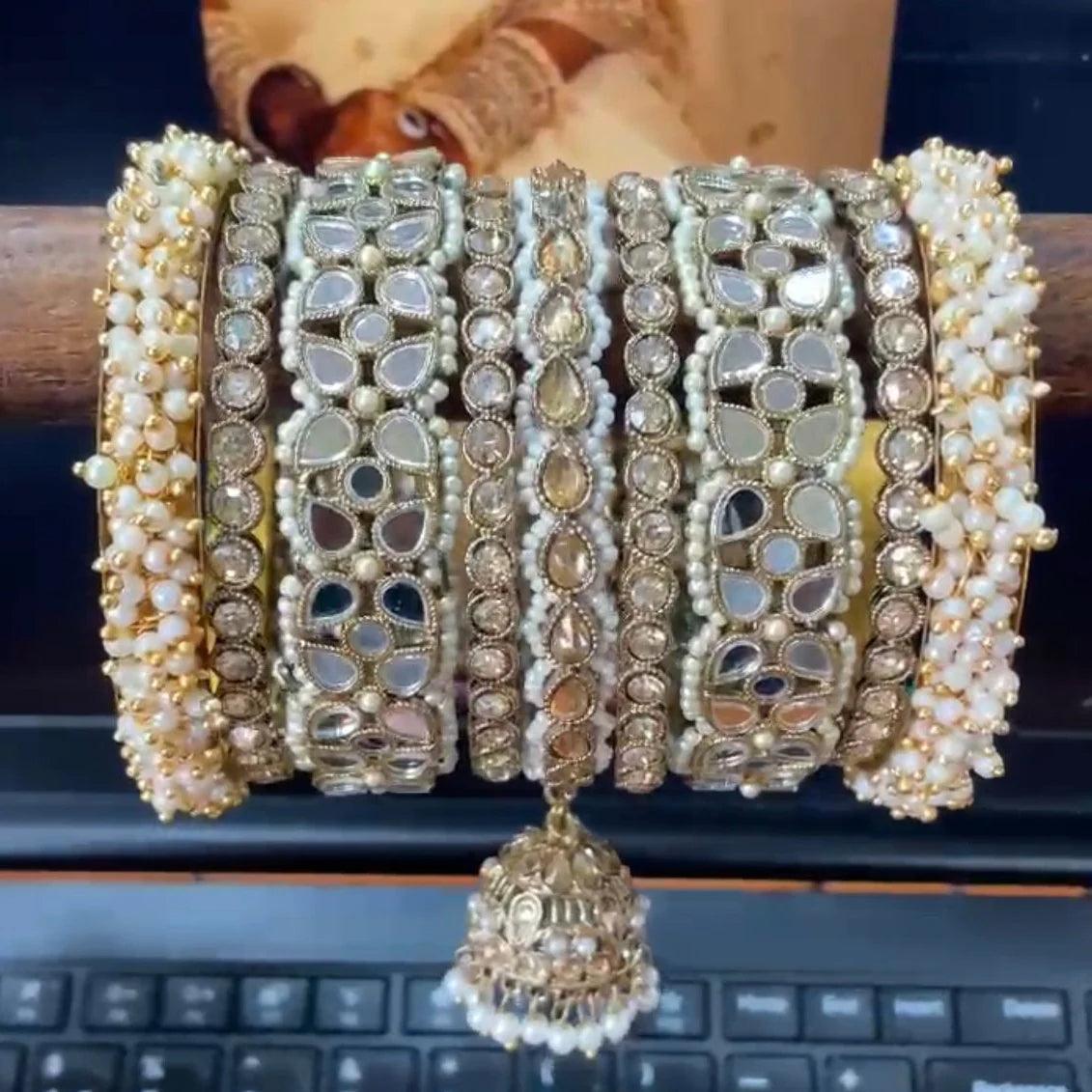 Golden stone mirror pearl Indian bangles with jhumki, Set of 2 - Libasaa