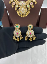 Regal Multi-Strand Pearl & Kundan Necklace Set with Ruby & Emerald Earrings - Libasaa.com