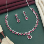 Silver-Plated Red Stone Necklace Set with Earrings | Bridal & Party Wear Designer Jewelry - Libasaa.com