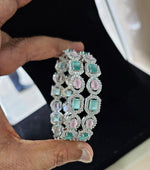 Pakistani bangles set with a Bollywood touch offering ethnic beauty and modern flair for weddings and special events - Libasaa.com