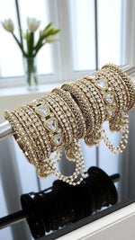 Star Kundan Stone Jhumki Bangles Set Bridal Chura with Hanging Pearls & Golden Finish - Libasaa.com
