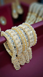 Elegant Gold-Plated Pearl & Kundan Bridal Bangles with Hanging Tassels - Libasaa.com