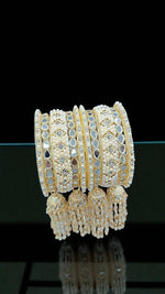 Elegant Gold-Plated Pearl & Kundan Bridal Bangles with Hanging Tassels - Libasaa.com