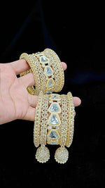 Luxury Gold-Plated Bridal Bangles with Crystal Stones & Jhumka Tassels - Libasaa.com