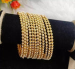 Gold plated pearl bangles