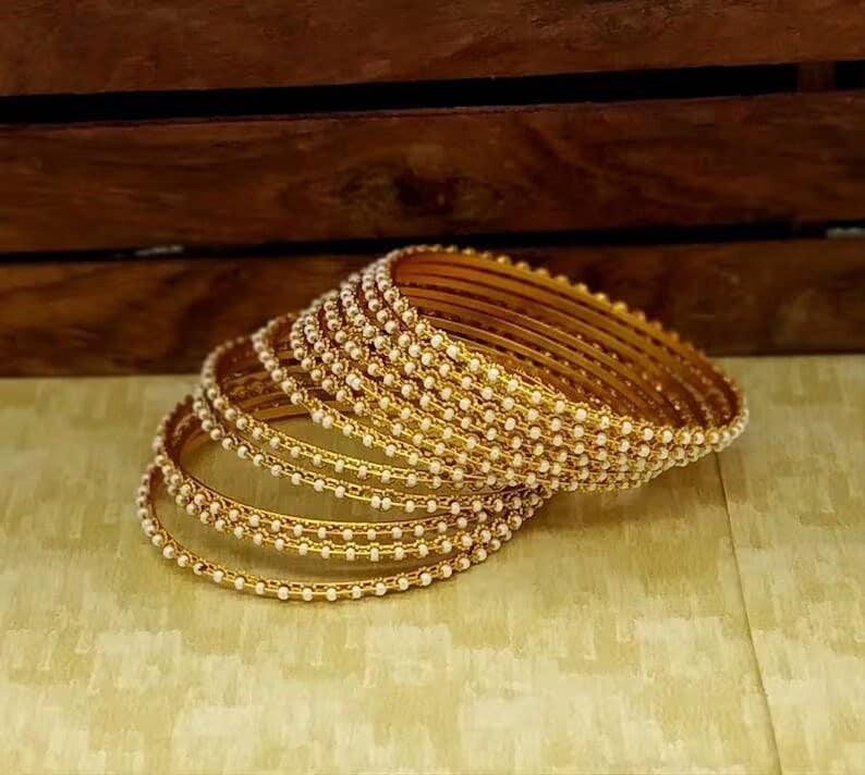 Gold plated pearl bangles