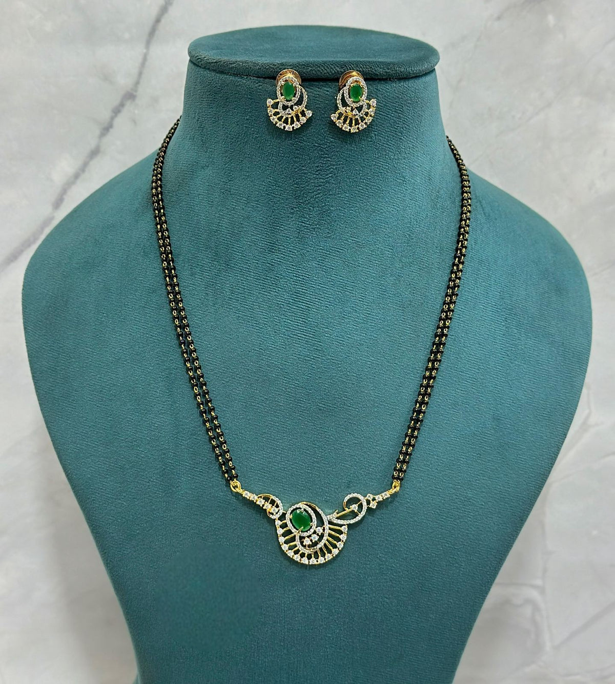Designer Green CZ Mangalsutra Set with Double Chain & Matching Earrings
