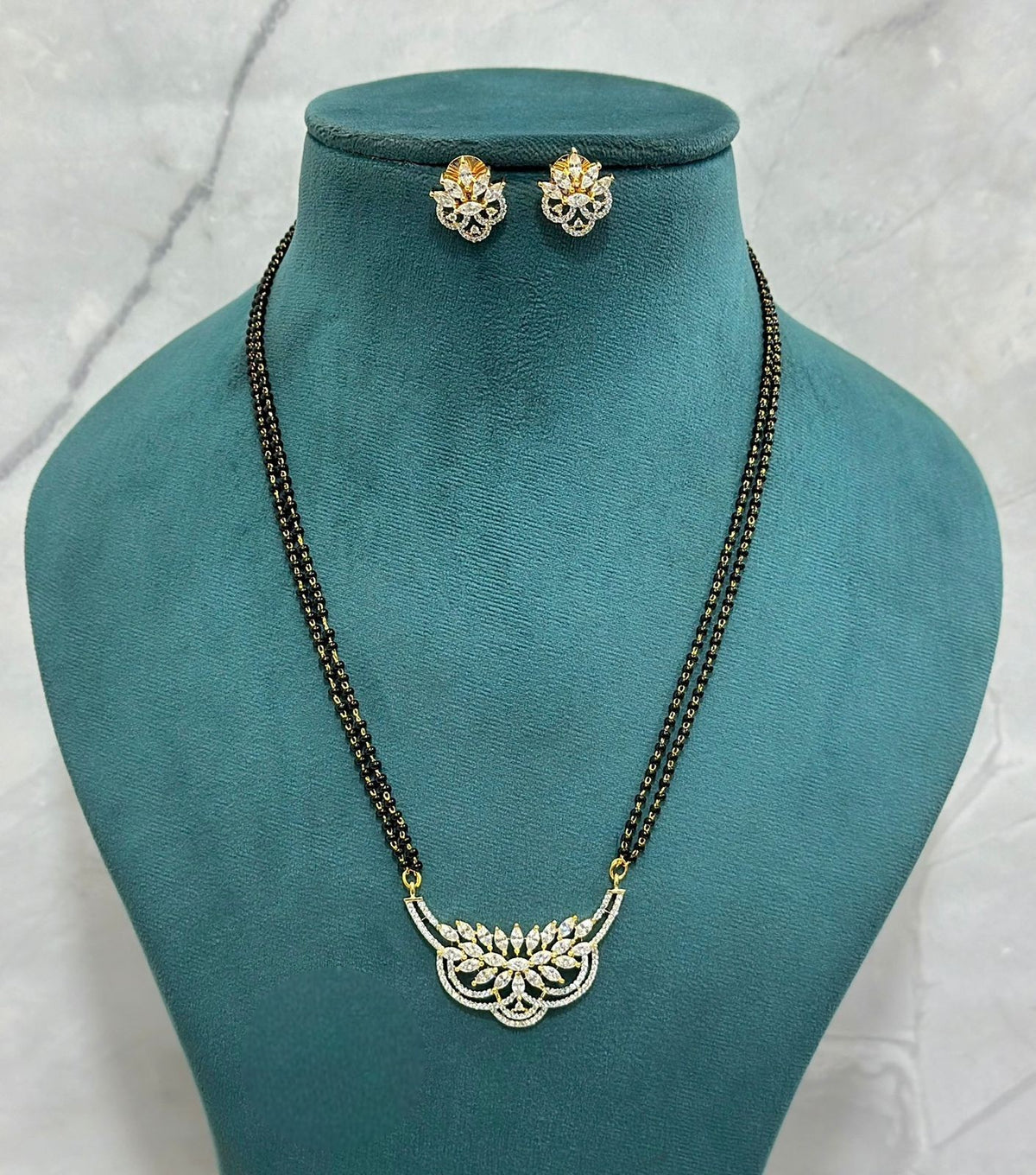 Floral Charm CZ Mangalsutra Set with Elegant Petal Design & Matching Stud Earrings