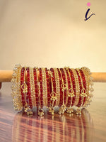 Raindrop Bangles Combo Set with 6 Golden Kashmiri Ghunghroo, 12 Golden Metal Bangles & 2 Golden Kada | Premium Indian Bridal Jewelry Set