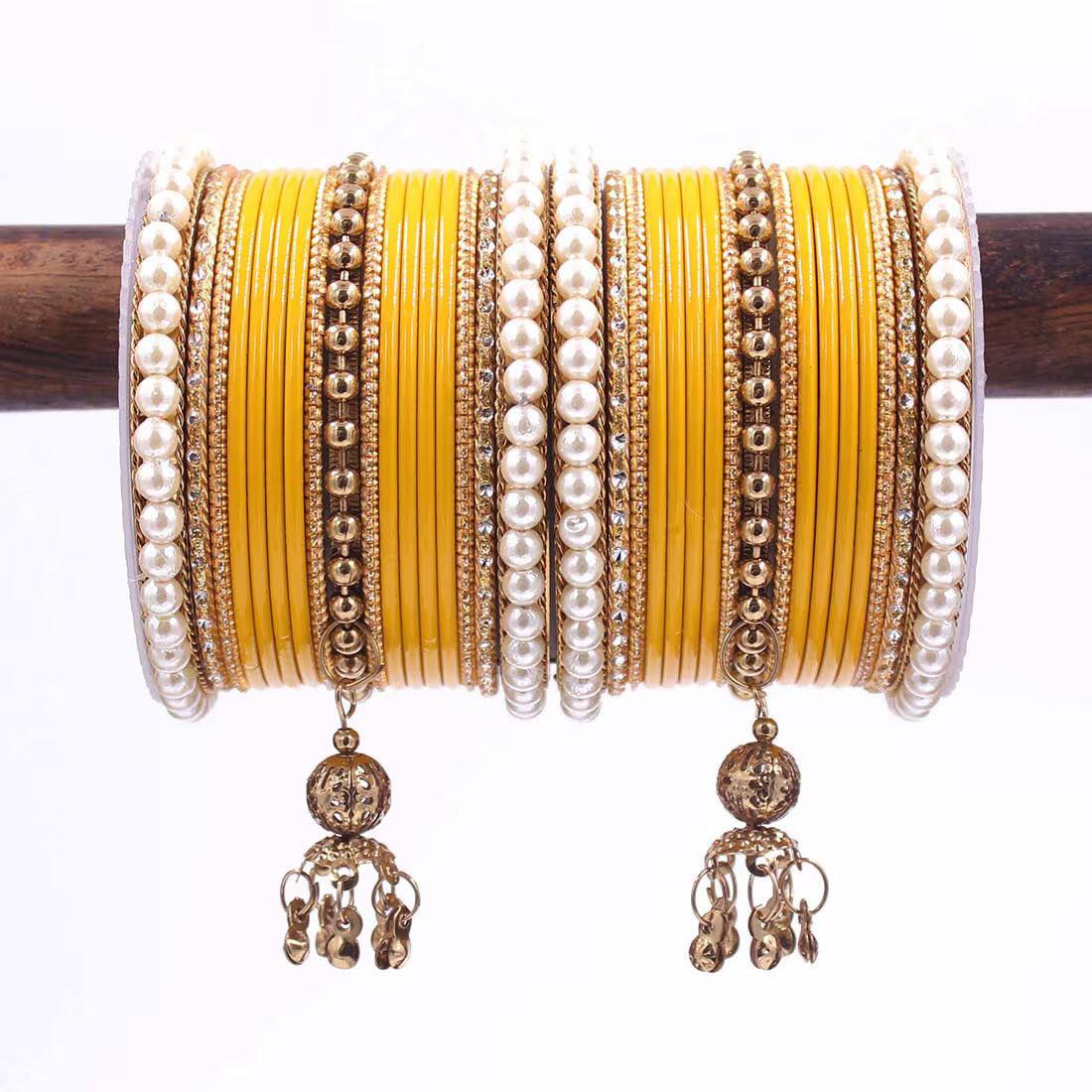 Indian bangle set , Bridal bangles, Metal bangles, Traditonal wedding jewelry, Brass Metal and Pearl Bridal Bangle Set with Jhumki - Libasaa