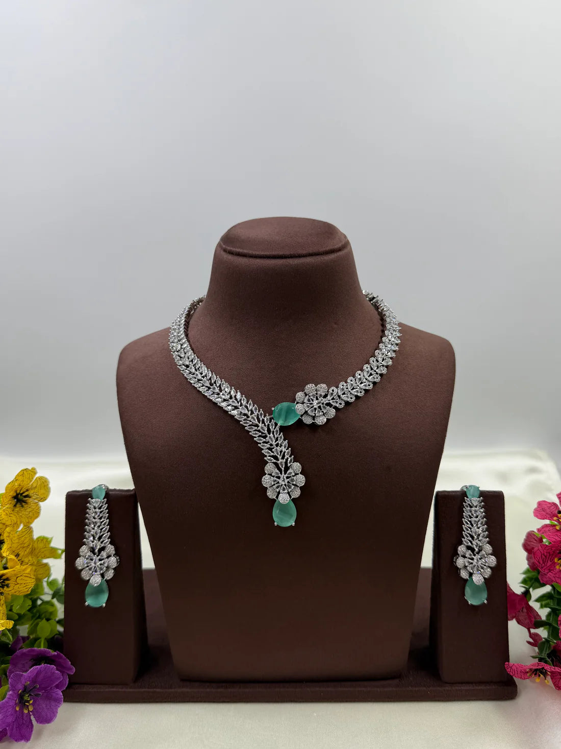American Diamond Floral Drop Necklace Set with Green Teardrop Stone – Silver Plated Bridal & Wedding Jewellery for Women