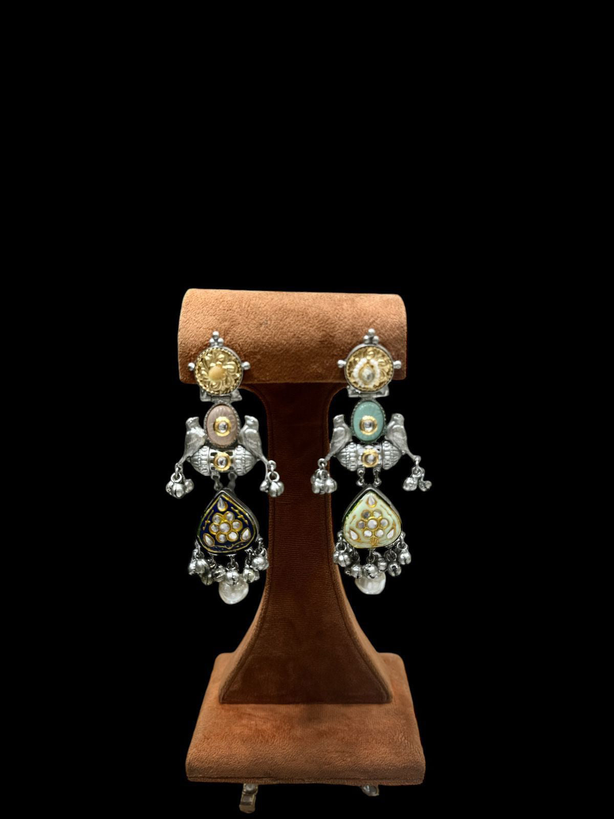 Ethnic Styles Inspired Earrings The design suggests a mix of tribal and Kundan influences combined with jhumka-like elements