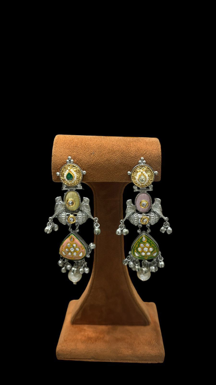 Ethnic Styles Inspired Earrings The design suggests a mix of tribal and Kundan influences combined with jhumka-like elements