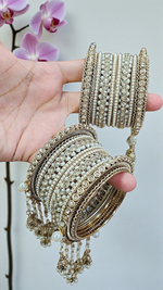 Khushi Moti Jhumri Bangles Set – Elegant Pearl-Studded Traditional Beauty - Libasaa.com
