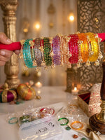 Libasaa.com set of 8 colorful Kashmiri bangles with ghunghroo and raindrop design, perfect for bridal wear.